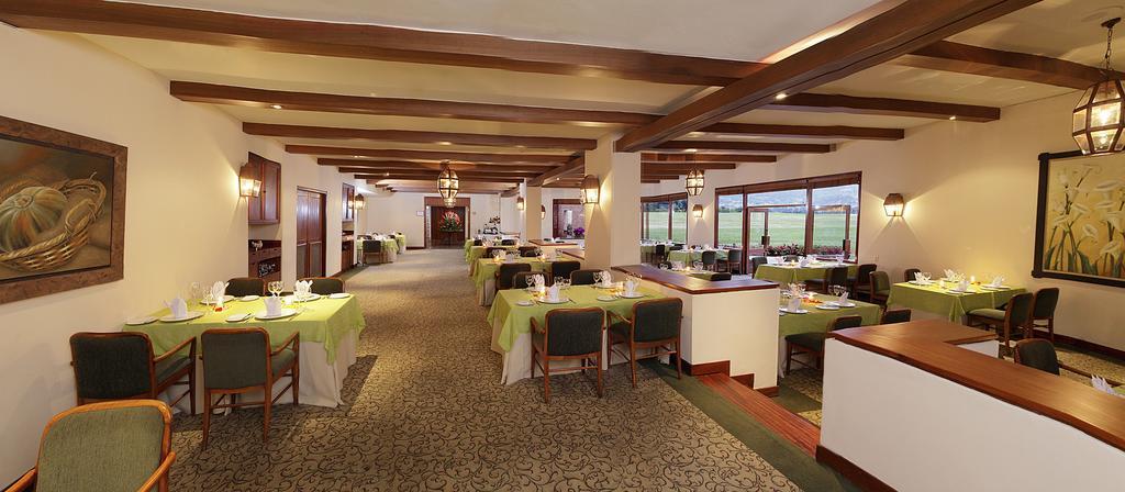 Estelar Paipa Hotel Spa & Y Centro De Convenciones Exterior foto The restaurant at the clubhouse